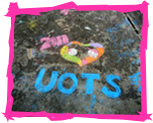 United Order True Sisters Logo on a sidewalk